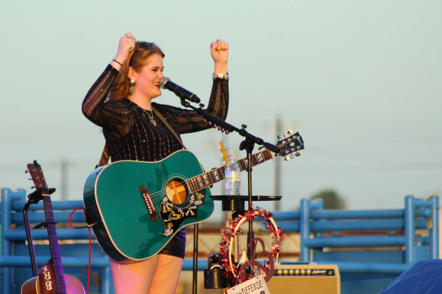 Elle Townley engages with the Jarrell crowd after performing her original song, "Taking off my Halo" during her set. Photo by Nalani Nuylan.