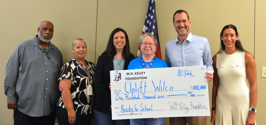 From left, Keith Parker, JISD Communities in Schools site coordinator; Evelyn DeJesus, JISD social worker; Jane Medema, Purl Elementary School counselor; Gloria Casso, Family Support Specialist at Mary Bailey Head Start; Carl Illig, executive director of the W.D. Kelley Foundation; and Shannon Illig, operations manager of the W.D. Kelley Foundation, at the check presentation on August 17. (Photos by Kaitlyn Wilkes)