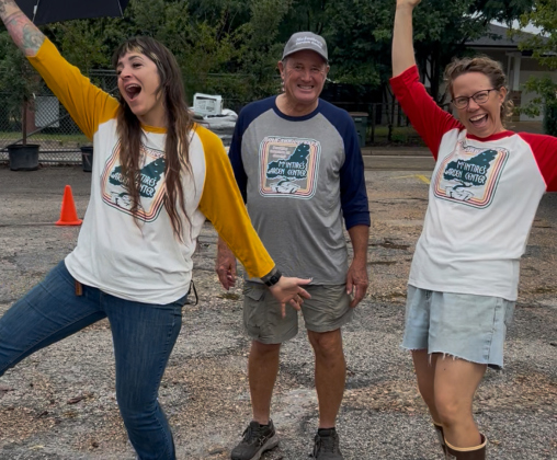 Staff members, from left, Melissa Conrad, Mark Ney and Liz Nuse wear McIntire’s Garden Center’s anniversary merch.