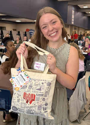 Landrie Mays, first-year teacher at Purl Elementary School, smiles with her welcome bag that was given to 315 new teachers throughout Georgetown. (Courtesy Georgetown Chamber of Commerce)