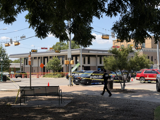 Officers with Georgetown Police Department close off the Square after an officer-involved shooting on Saturday. Photo by Kathryn Manasco