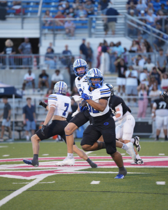 Georgetown’ Zechariah Guyton runs for a big game against Hendrickson on Friday, September 11.  Photos by Lawson Richter