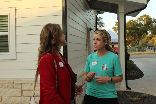 Isaiah 117 House of Williamson County location leader Tara Thornton (right) speaks with Judge Sarah Moore of the 512 District Court (left) during the Isaiah House first-year anniversary party, September 13. Photo by Nalani Nuylan.