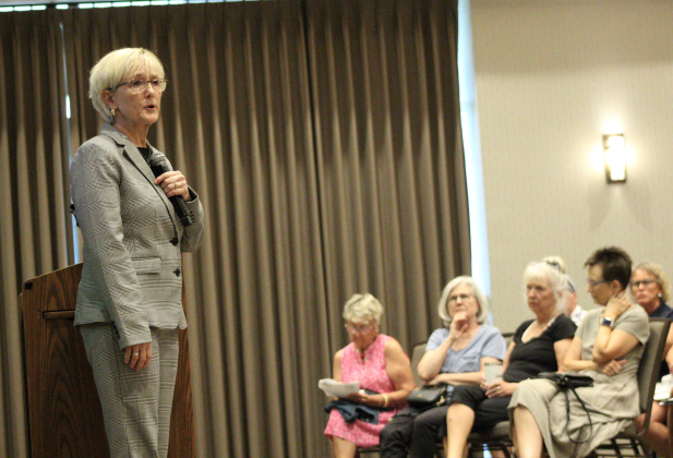 County Commissioner Valerie Covey, left, hosts a town hall addressing concerns about Somerset Hills Road District No. 3 and No. 4 to Sun City residents at the Retreat Amenity Center, September 15.  Photo by Nalani Nuylan