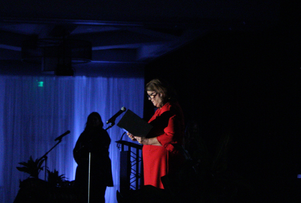 Susan Gregurek, director of the Jarrell Community Library and Resource Center, shares how the Central Texas Community Foundation has helped the library during the eighth annual Legacy Luncheon, September 16. Photo by Nalani Nuylan.