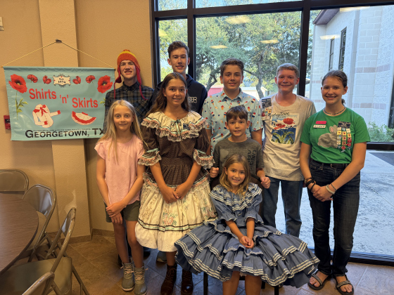 Shirts ’n’ Skirts members (back, from left) Nathan Rhinehard, Evan Rhinehard, Nick Carter, Allen Einkauf, Meg Rhinehard, (middle, from left) Loretta Conrad, Aria Conrad, Everett Conrad and (front) Saoirse Conrad. Photo by Abbey Archer