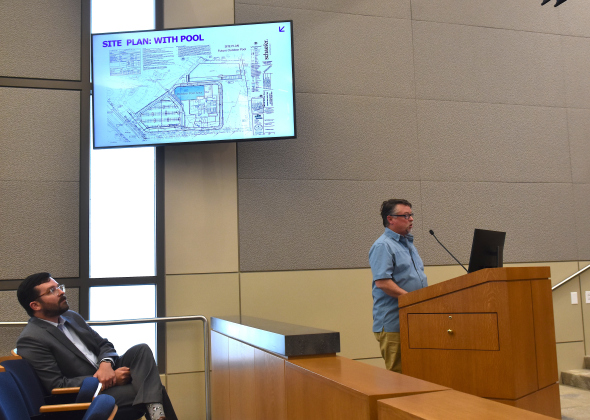 Jack Daly, Georgetown assistant city manager, left, and Jeff Andresen, president and CEO of YMCA Central Texas, give an update on the Georgetown YMCA facility during the August 25 City Council workshop. (Photo by Kaitlyn Wilkes)