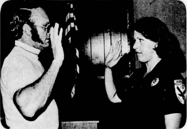 September 9, 1976: Linda Rumbaugh of Salado is sworn in as Georgetown's first female police officer by Asst. City Manager W. L. Walden. A dispatcher for the Georgetown police department the past four years, 24-year-old Rumbaugh got her badge in a City Hall ceremony last week and began patrol duties immediately. She completed officer training with three other women last month at Southwest Texas State University in San Marcos.