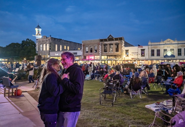 Suzy and Craig Stewart danced to the music of “Last of the Petty Cash” during the First Friday free concert held on the Williamson County Courthouse lawn on Friday, October 16, 2026. Rain moved the October concert to this Friday. One more First Friday concert will be held in November. Photo by Andy Sharp
