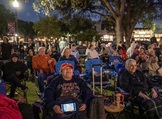 Skipper Smith (in red cap at front) enjoyed a performance by “Last of the Petty Cash” during the First Friday free concert held on the Williamson County Courthouse lawn on Friday, October 16, 2026. Rain moved the October concert to this Friday. One more First Friday concert will be held in November. Photo by Andy Sharp