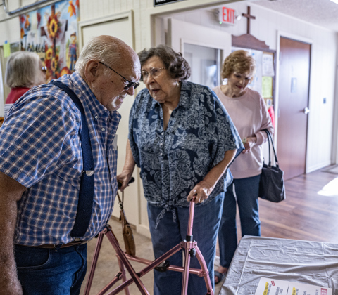 Alber Walther (first name is correct, no t at the end) his wife Adeline, center, and Carlene Schultz, right, were among the dining guests during the Third Annual St. Peter Lutheran Church Hamburger Fundraiser on Saturday, October 17, 2026. A Country Store and Quilt Raffle were also held. The church is at 2929 FM 972 in Walburg. Photo by Andy Sharp