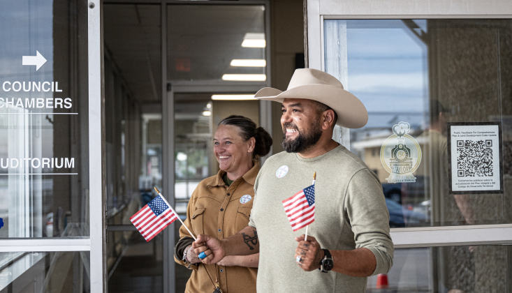 Chris Jimenez, running for Texas House District 52, is shown with his wife Katy after they voted at Taylor City Hall on Monday, October 19, 2026. The event that included a march to City Hall, was coordinated by the East Wilco Democrats. Photo by Andy Sharp