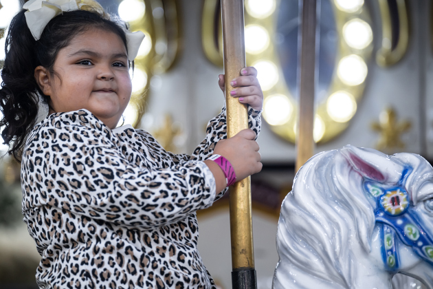 5-year-old Olivia Hernandez enjoyed her ride on a merry-go-round during the Williamson County Fair, held on Wednesday, October 21, 2026. The fair and the Wiliiamson County Rodeo continued through October 24th at the Williamson County Expo Center. Photo by Andy Sharp