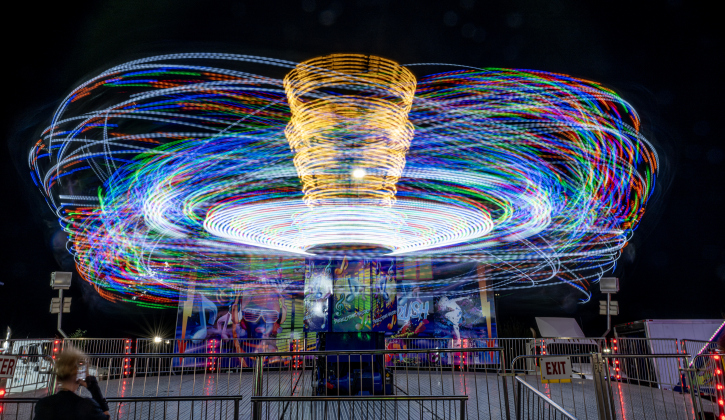 A carnival ride stays in constant motion during the Williamson County Fair, held on Wednesday, October 21, 2026. The fair and the Wiliiamson County Rodeo continued through October 24th at the Williamson County Expo Center. Photo by Andy Sharp