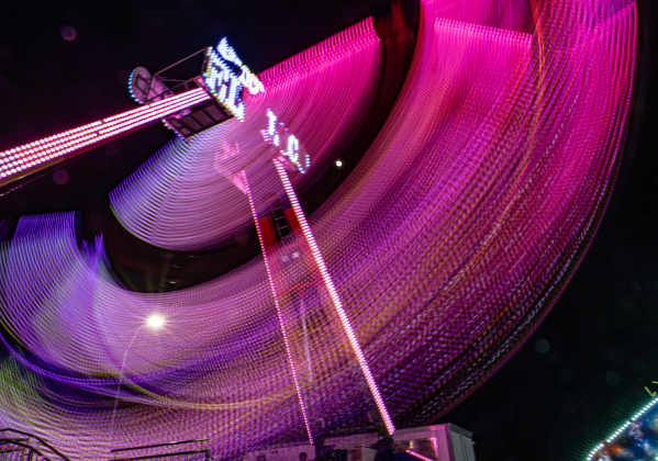 A ride called El Loco stays in constant motion during the Williamson County Fair, held on Wednesday, October 21, 2026. The fair and the Wiliiamson County Rodeo continued through October 24th at the Williamson County Expo Center. Photo by Andy Sharp