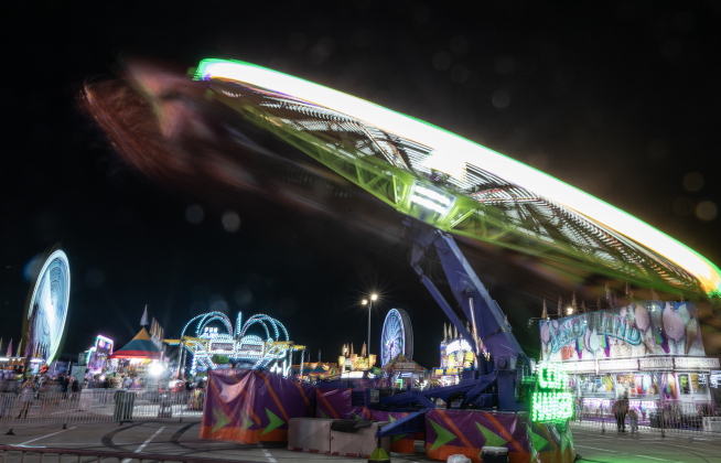 Carnival rides light up the midway during the Williamson County Fair, held on Wednesday, October 21, 2026. The fair and the Wiliiamson County Rodeo continued through October 24th at the Williamson County Expo Center. Photo by Andy Sharp