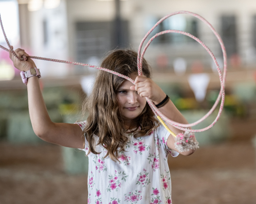 8-year-old Abby Arjona works on her roping skills at the FarmTastic Farm Zone during the Williamson County Fair, held on Wednesday, October 21, 2026. The fair and the Wiliiamson County Rodeo continued through October 24th at the Williamson County Expo Center. Photo by Andy Sharp