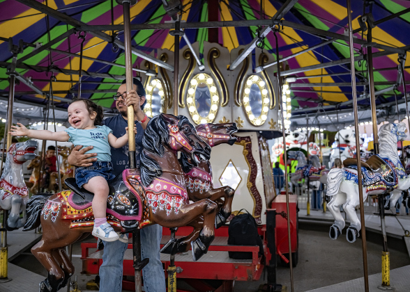 2-year-old Ashley Diaz and her father Edwin Diaz enjoyed a ride on a merry-go-round during the Williamson County Fair, held on Wednesday, October 21, 2026. The fair and the Wiliiamson County Rodeo continued through October 24th at the Williamson County Expo Center. Photo by Andy Sharp