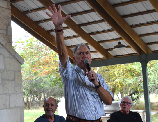 Resident Kim Williams speaks to his neighbors at an event he hosted on October 14 about new age-restricted housing that will go in near Sun City. (Photo by Kaitlyn Wilkes)