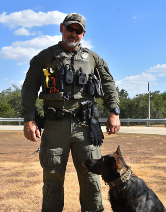 Georgetown Police Department K9 Sergeant Matt Turowski stands with his police dog Raido, who he has had for four years. (Photos by Kaitlyn Wilkes)