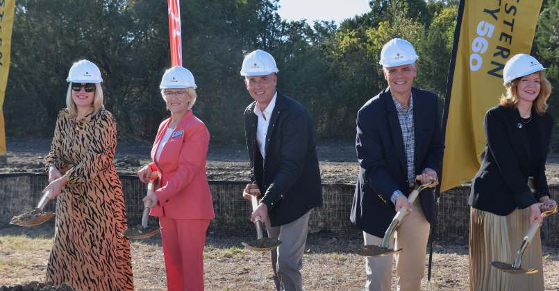 From left, Georgetown City Council Member Amanda Parr (who works at Southwestern), County Commissioner Valerie Covey, Mayor Josh Schroeder, City Manager David Morgan and Southwestern University President Laura Skandera Trombley break ground on the SU 560 development on October 23. (Photo by Kaitlyn Wilkes)
