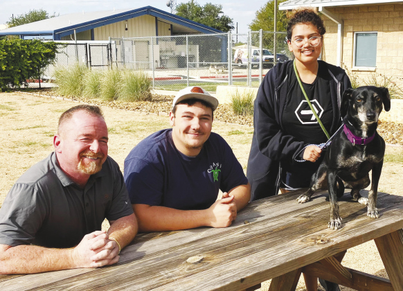 Jail to Jobs Program Director Eddie Franz, left, and Supervisors Payton Wall and Eulalia “Lala” Kling take a break at the Williamson County Regional Animal Shelter.