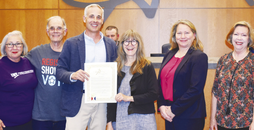 Georgetown Mayor Josh Schroeder, center, presented members of the League of Women Voters of Williamson County with a proclamation naming November 2 as Jessie Daniel Ames Day within the city. The proclamation comes one week before Jessie Fest, a November 2 event recognizing Ms. Ames’ efforts in the women’s suffrage movement and against racial violence. Pictured left to right are League members Vicki Stubbington, Greg Wallace, Mr. Schroeder, Helen Cordes, President Pam Mitchell and Jan Wallace.