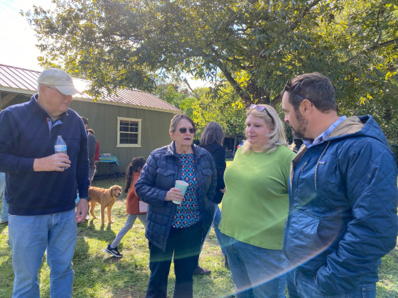 Georgetown residents Larry Olson, Penny Bland and Shelley Blans speak with District 1 Council Member Jake French, right. PHOTOS COURTESY OF JEN BRADAC