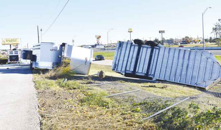 Trailers lay on their sides Tuesday morning near Interstate 35 south of Jarrell after Monday evening’s storm. KATHERINE ANTHONY