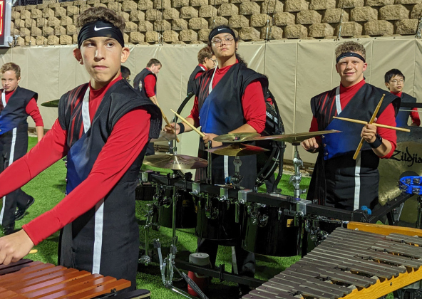 Students in the ensemble range across all grades.