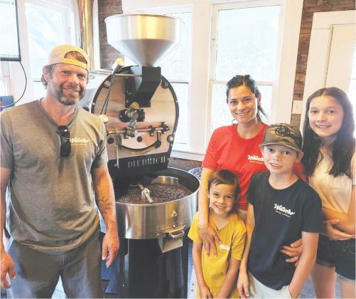 Mike and Amy Bresnan work with their children Lacey, Lane and Jase.
