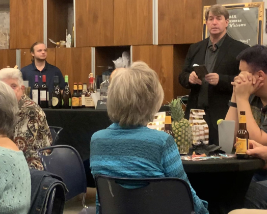 Ron Watson, executive artistic director at the Georgetown Palace Theatre, addresses a crowd of donors, board members and patrons before the opening night performance of Cabaret. BRIGID COOLEY