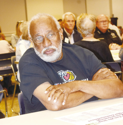 Participant Richard Glasco listens during Thursday’s forum. KATHERINE ANTHONY