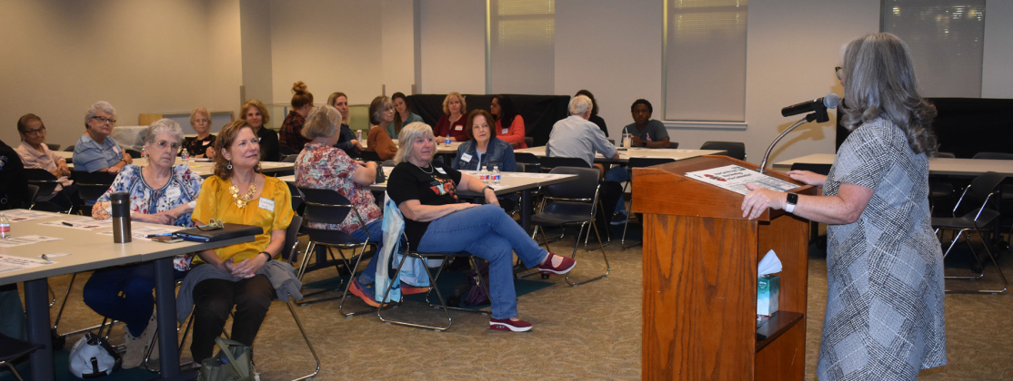 Pastor Sharolyn Browning welcomes participants Thursday.