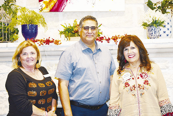 From left, Carrie Barry, director of senior nutrition with Meals on Wheels, Executive Director Marco Cruz and WHO Vice President Maria Tolleson.