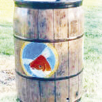 “A Glass of Goldfish” by Michael Clark won the fan favorite award in Georgetown’s Painted Rain Barrel Project competition.