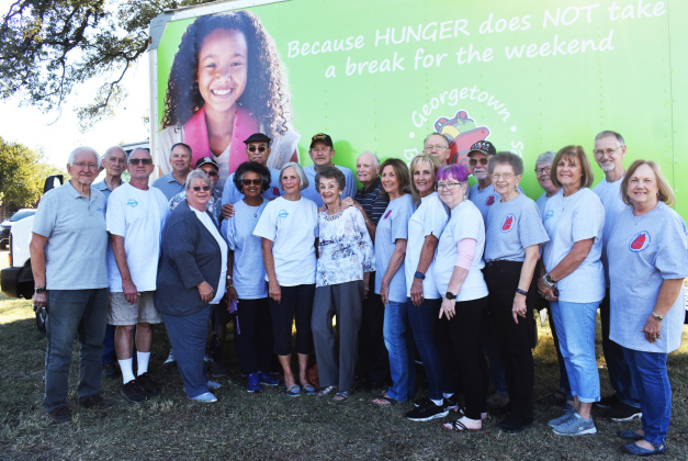 Backpack Buddies has more than 100 volunteers. Volunteers gathered Wednesday to pack weekend deliveries to GISD campuses.