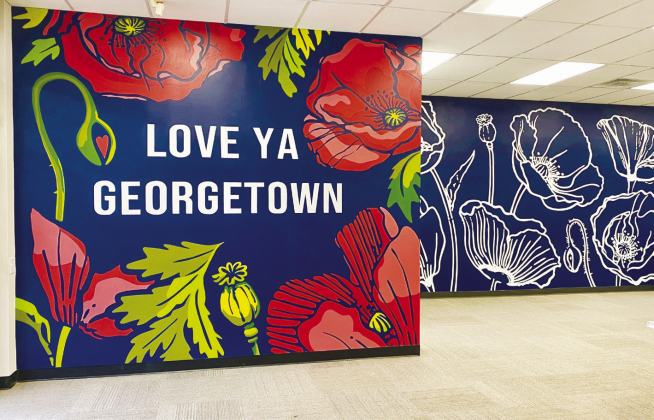 Gus’s Drug’s latest mural was created by artist Sarah Blankenship. PHOTO BY ELLEN GREENEY