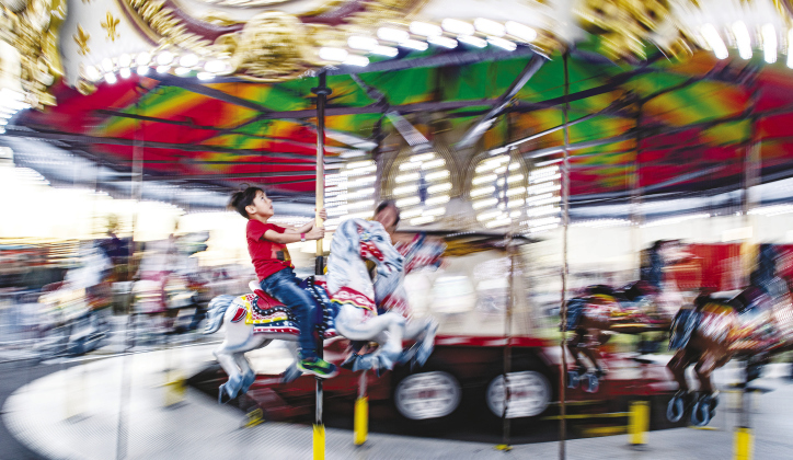 An old-fashioned merry-go-round was a popular ride during the opening night of the Williamson County Fair and Rodeo Wednesday.