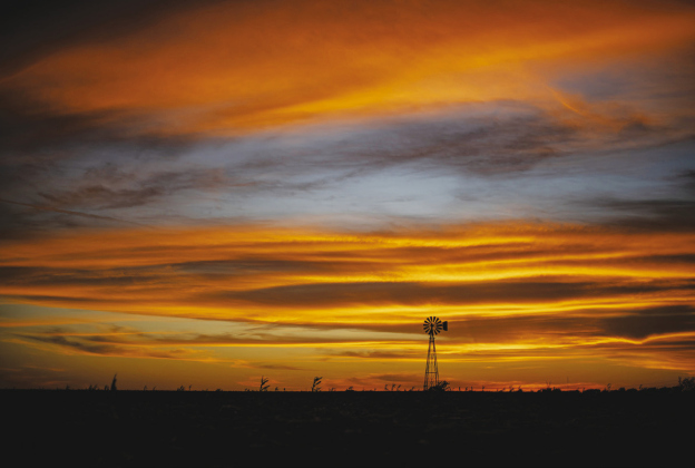 The western sky fills with color a little after sunset along County Road 339 east of Weir, October 22.