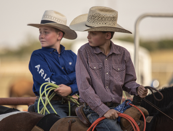 Trigg Isbell, 10, front right, and Beau Taylor, 11, prepare to compete in youth breakaway roping. Photos by Andy Sharp