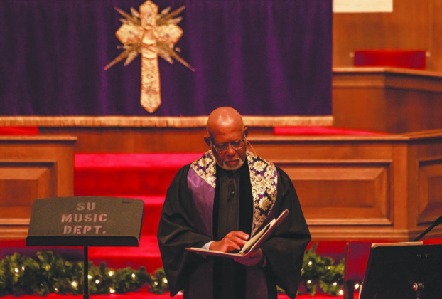 The Revered Dr. Ronald L. Swain, Southwestern University Chaplain, conducts a Candlelight Service of Lessons and Carols at Lois Perkins Chapel Thursday, December 1. The Candlelight Service, originally called the Christmas Carol Service, began at Southwestern University in 1915. A second service was also held later that evening. (Photos by Andy Sharp)