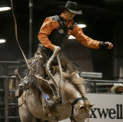 Reginald LeCourt of Mirabel Quebec, Canada participates in the Saddle Bronc competition.