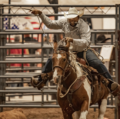 Chris Walton of Cleveland, Texas, competes in Tie Down Roping.