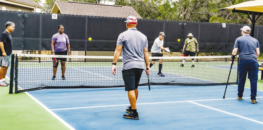 A group of soldiers who are part of the Army Recovery Care Program met with area pickleball clubs November 8 to learn the sport and get exercise. COURTESY FAITH BURNS