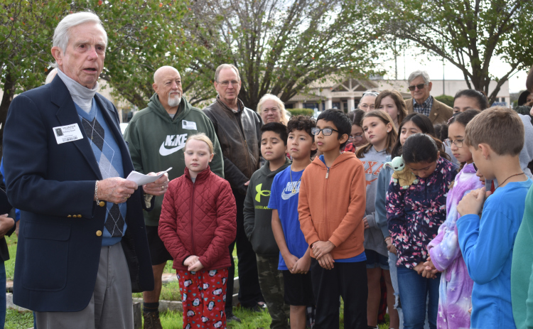 Rotarian Jim Deuser talks with Cooper students about how they can use the Peace Garden. (Photo by Katherine Anthony)