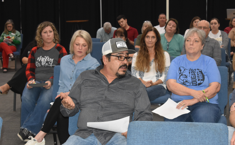 Jarrell residents express skepticism that the 1916 Building was not salvageable. They met with district leaders December 7. (Photo by Katherine Anthony)