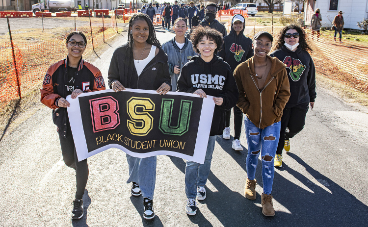 Members of the Glenn High School Black Student Union participate in the parade  during the Dr. Martin Luther King Jr.  National Holiday celebration  held in Leander on Monday, January 17, 2022.  This was the city of Leander's inaugural MLK holiday celebration.  In addition to the parade, there was a festival in the downtown area.  (Sun Archive)