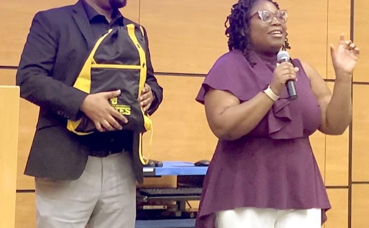 Dr. Malissa Ismaila, right, Southwestern’s director of student inclusion and diversity, addresses a crowd of roughly 25 people after Mr. Harris’ speech. (Photos by Brigid Cooley)