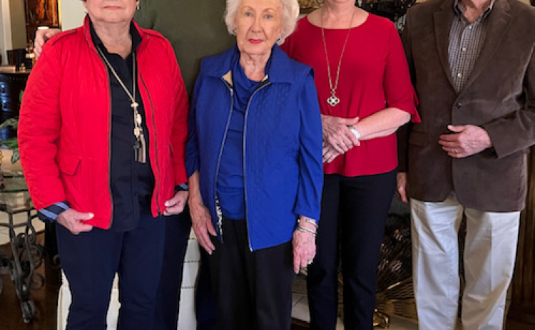 Alexia Griffin, Rob Neff, Joanne Harrah, Laurie Locke and Fred Sellers meet to discuss the agenda for the upcoming Central Texas Philharmonic League meeting. 